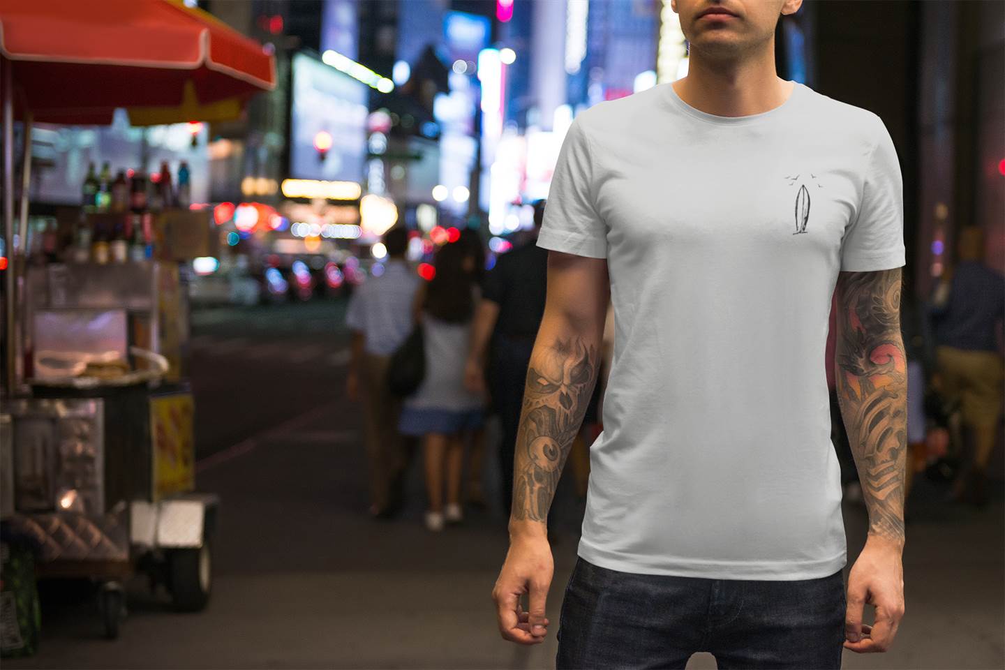Soft white Ericeira Surfboard Organic Menās T-Shirt with a small surfboard graphic. Ideal for casual wear, crafted from sustainable organic cotton.