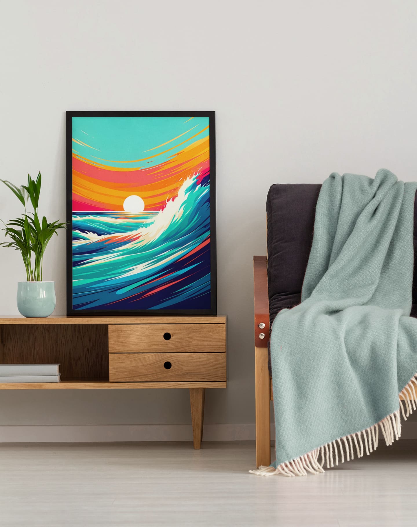 Costa Vicentina wave print in a black frame, leaning against a wall beside a cozy sofa. A perfect surf decor piece for relaxation spaces.