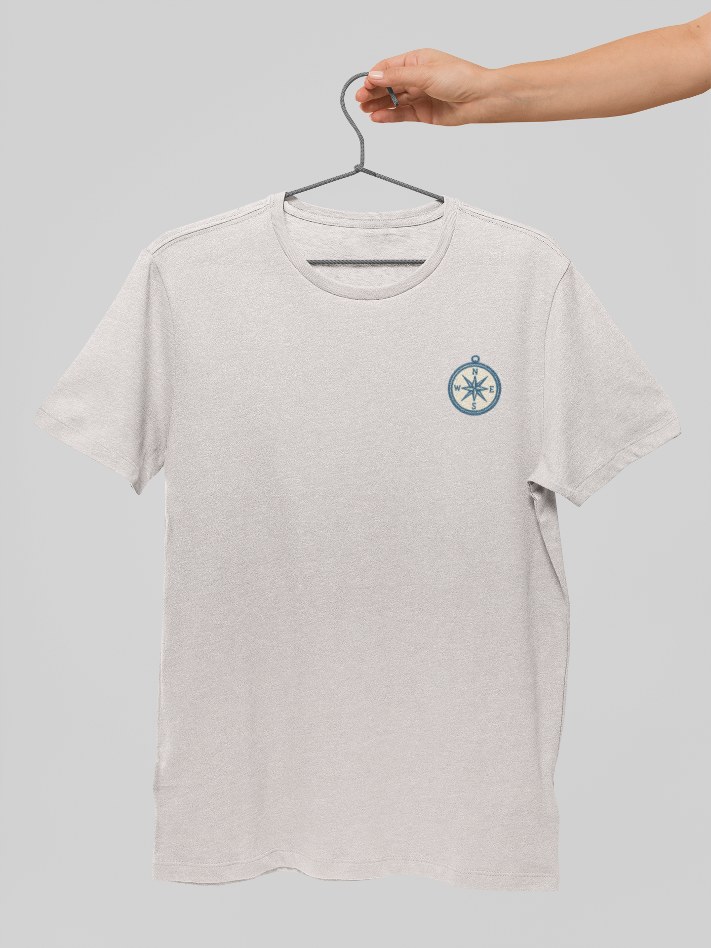 Atlantic Wave shirt with compass logo.