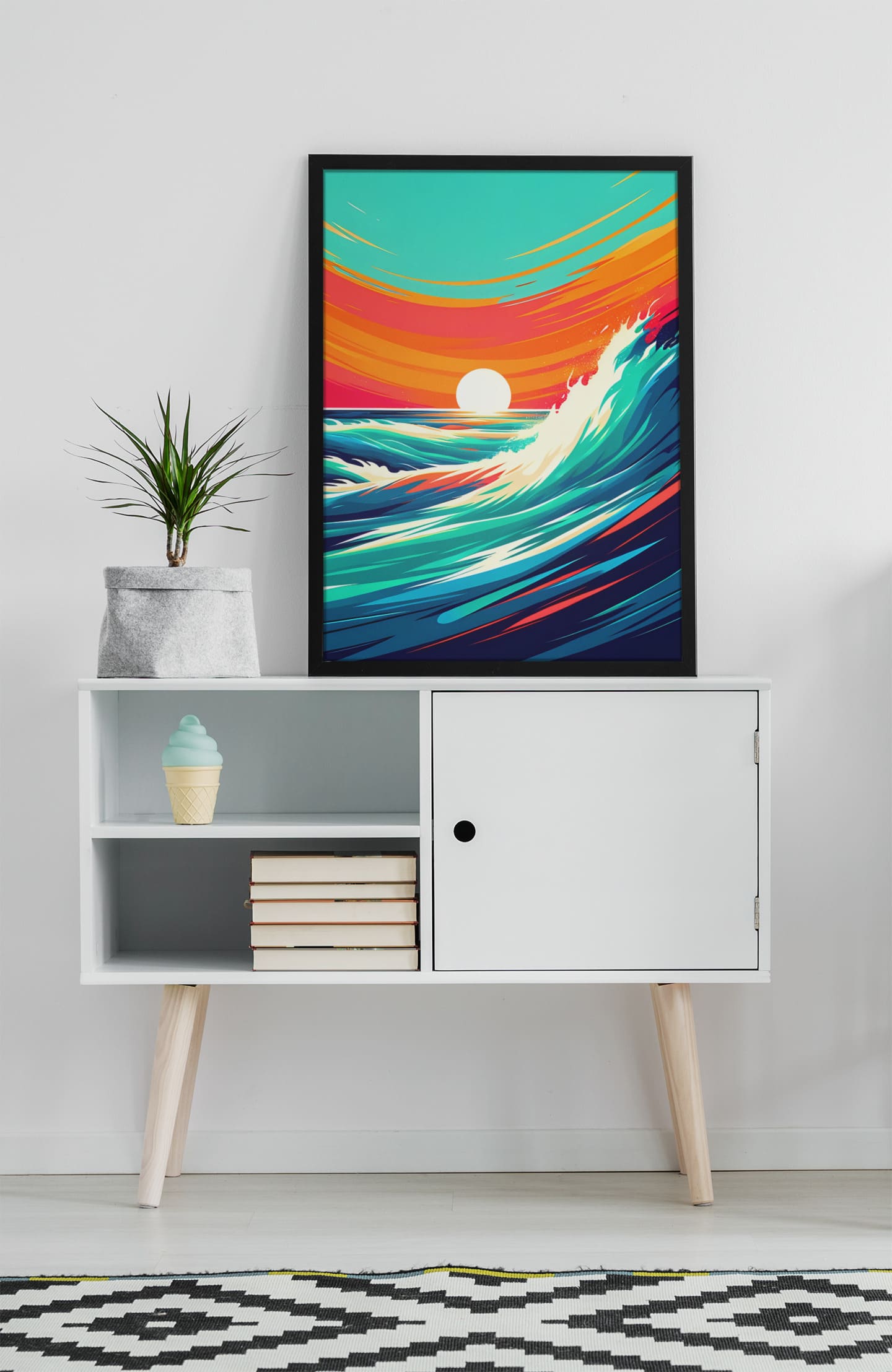 Costa Vicentina wave print in a black frame, placed on a white mid-century cabinet. A perfect surf-inspired artwork for home decor.