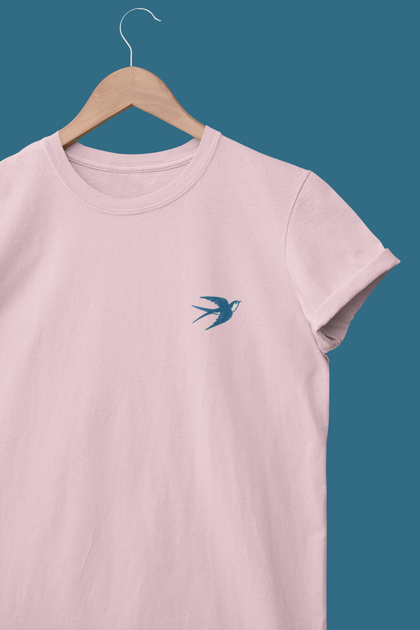 Relaxed fit unisex t-shirt with modern swallow illustration.