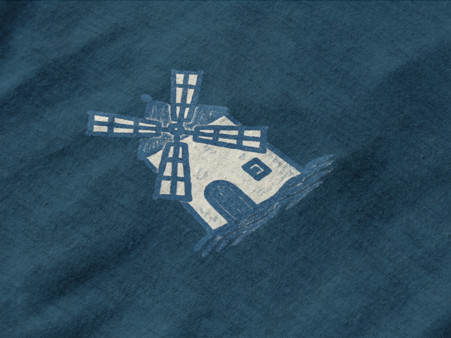 Eco-conscious shirt with subtle windmill print.