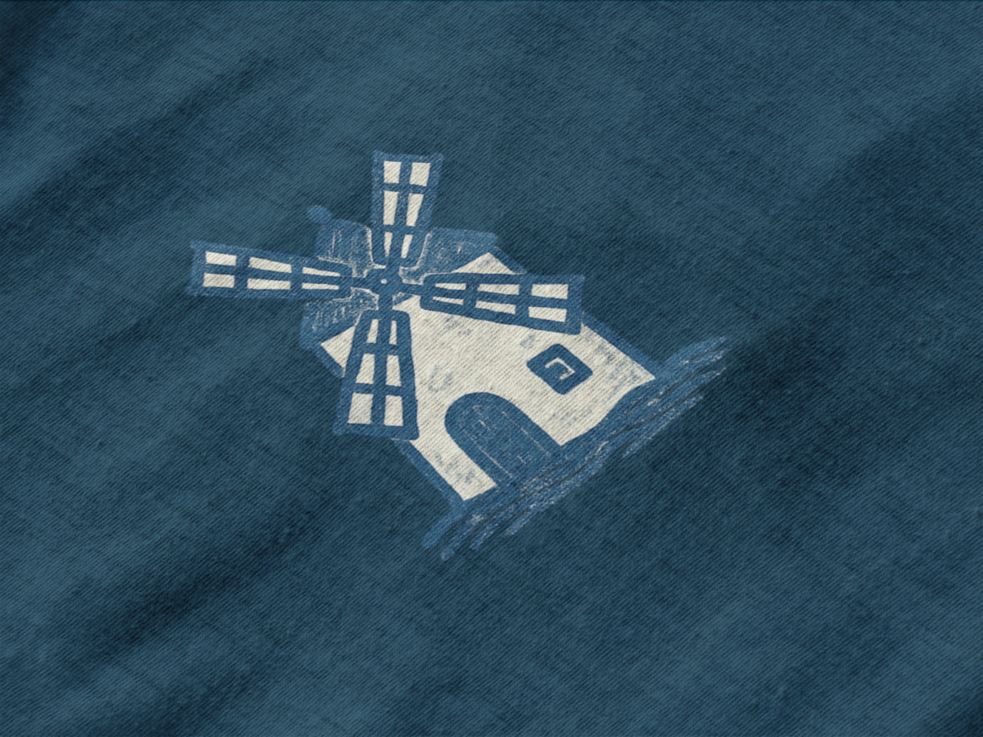 Eco-conscious shirt with subtle windmill print.