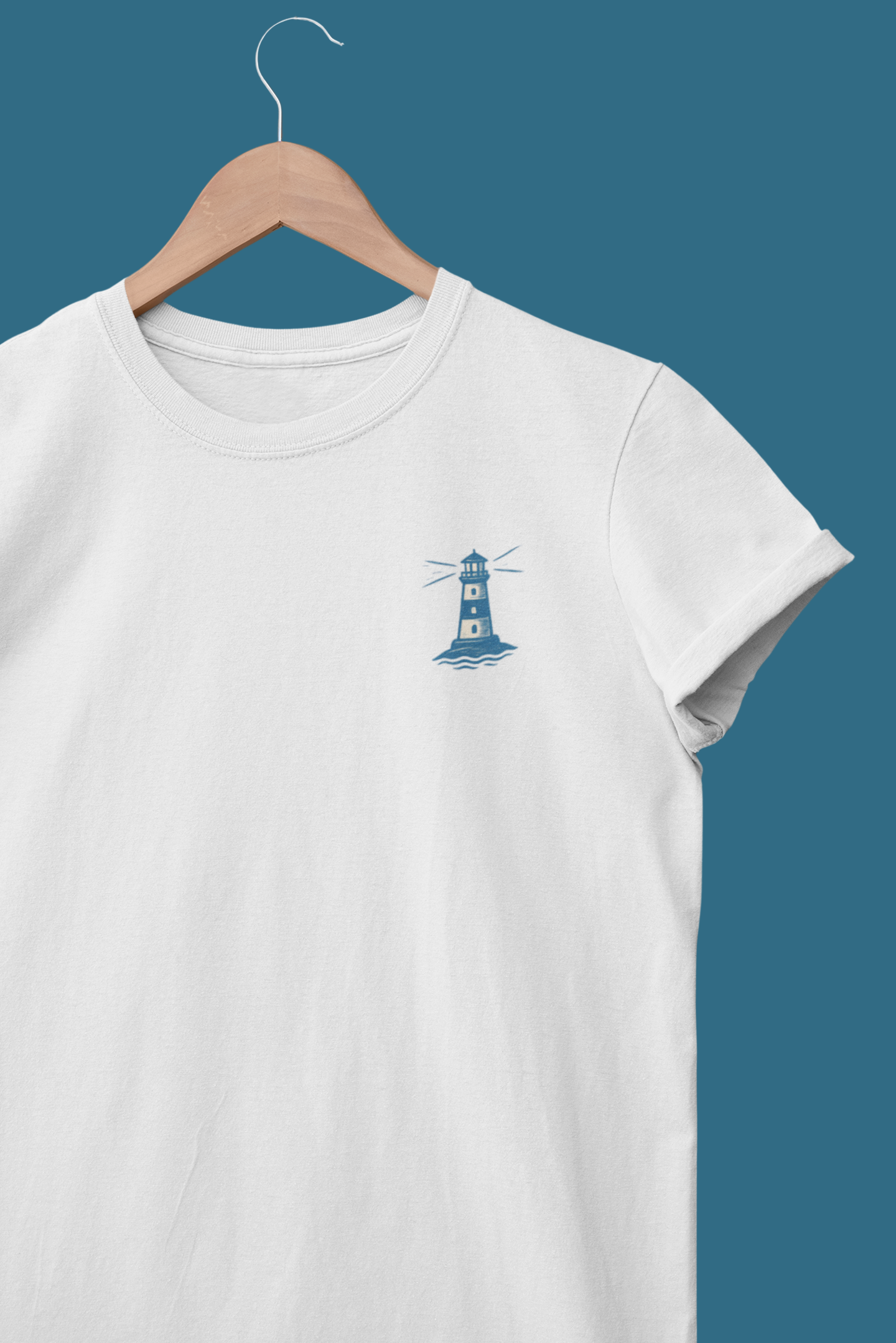Folded eco-friendly t-shirt with lighthouse line art.