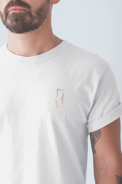 Bearded man in a white Portugal T-Shirt showcasing a minimalist embroidered map design, made from soft organic cotton for a unisex fit.