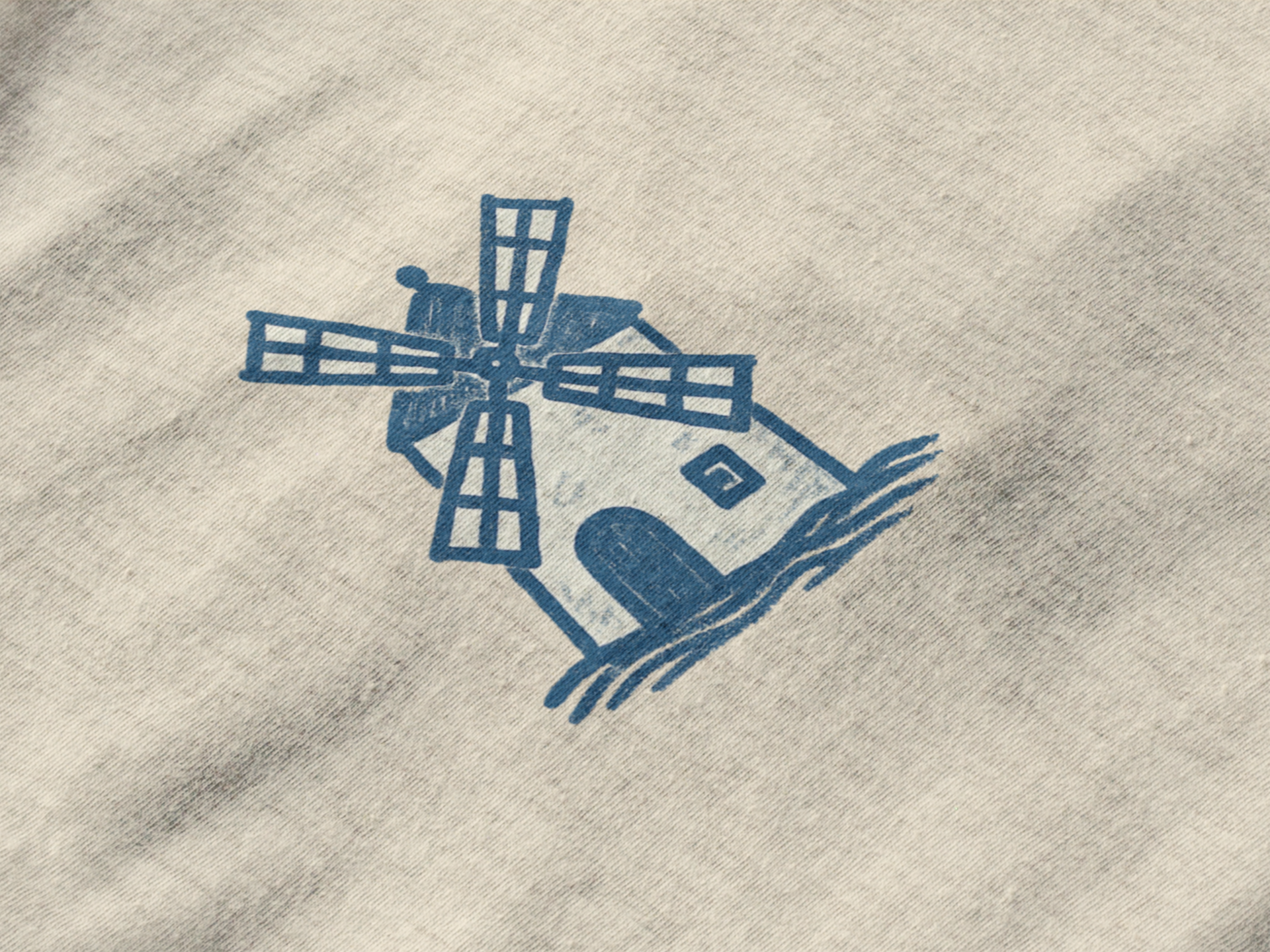 Relaxed fit unisex t-shirt with modern windmill graphic.