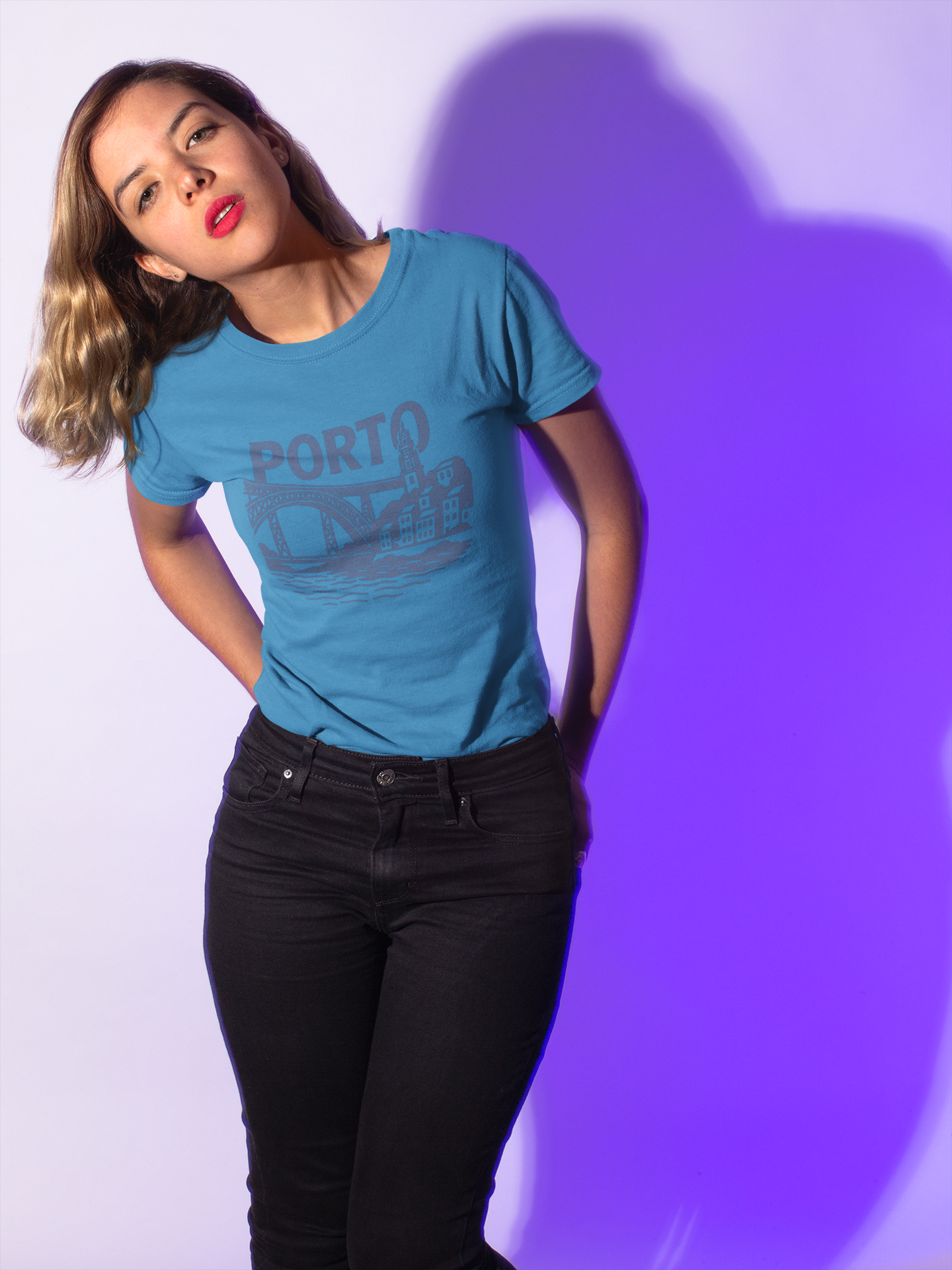 Flatlay of blue-letter Porto T-Shirt, soft cotton texture.