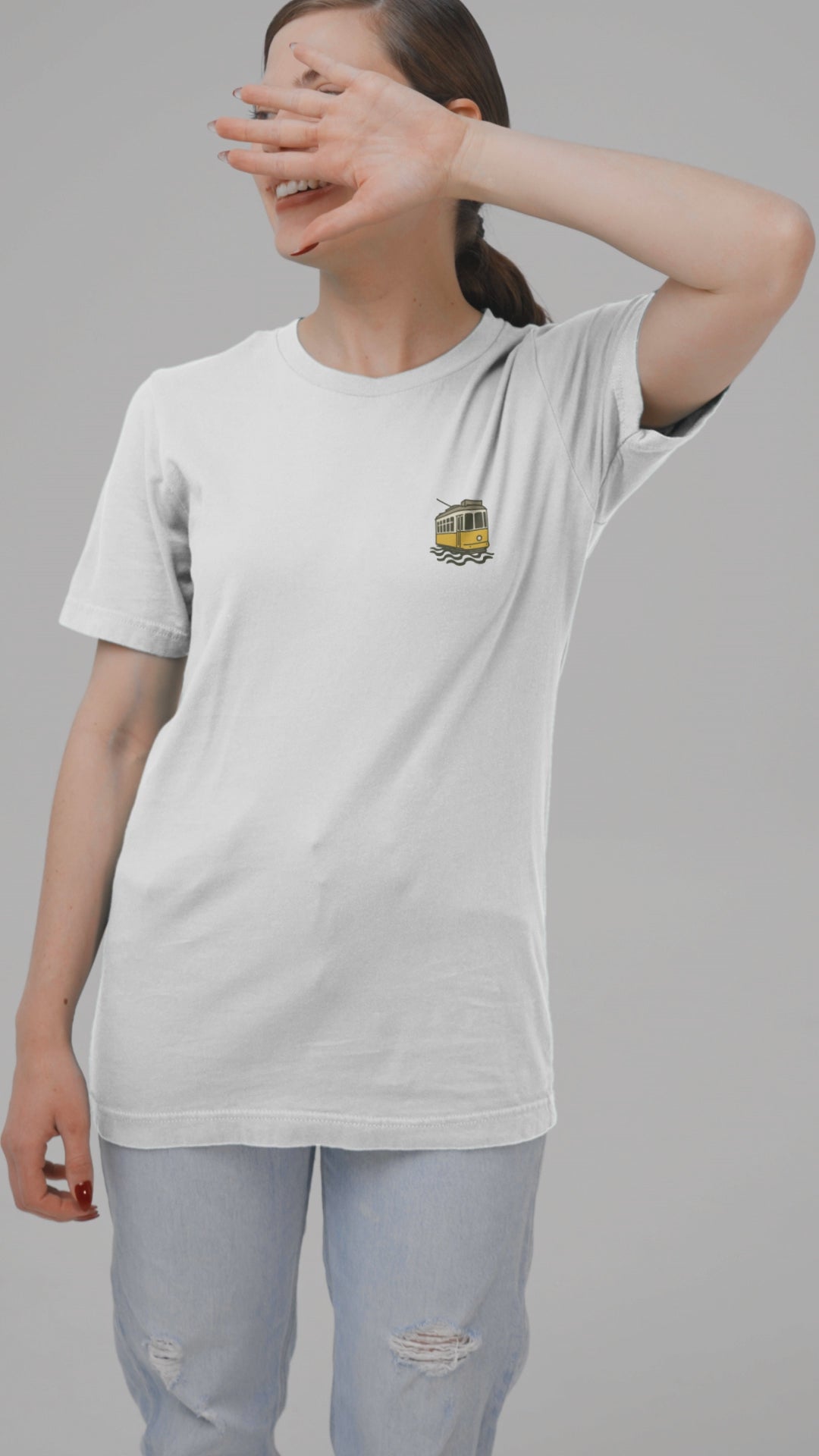 Unisex organic t-shirt with minimalist Lisbon tram logo.