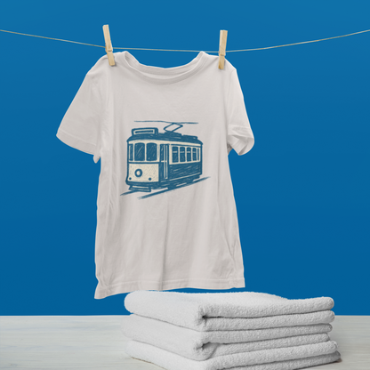 Folded eco-friendly t-shirt featuring brush line tram art.

