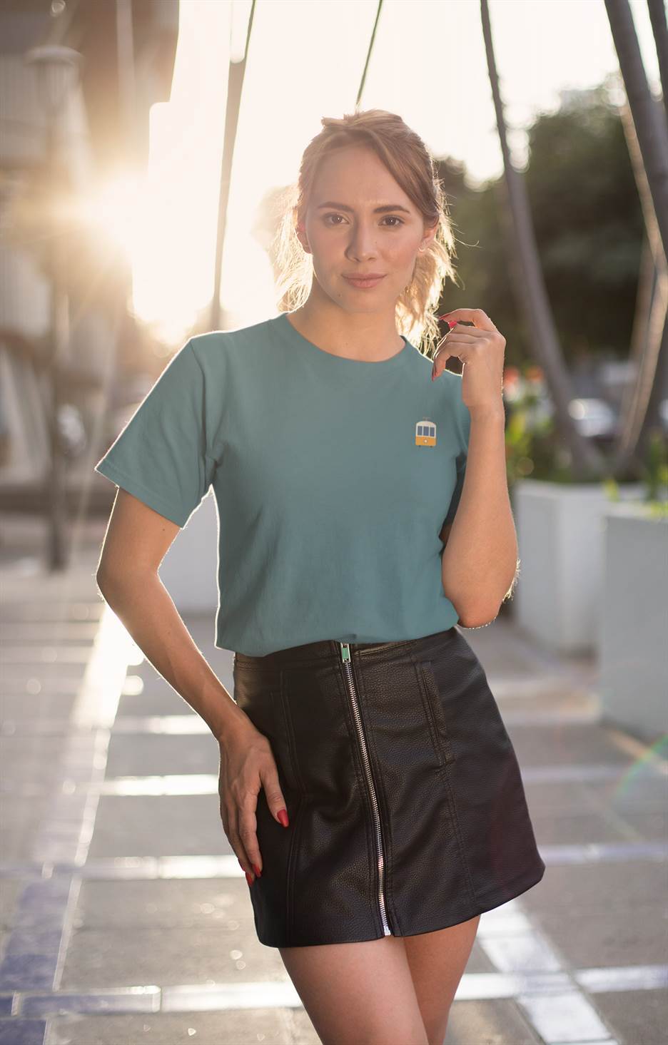 Teal Lisbon Electrico Tram T-Shirt with a subtle tram emblem. A stylish and eco-conscious choice in organic cotton.