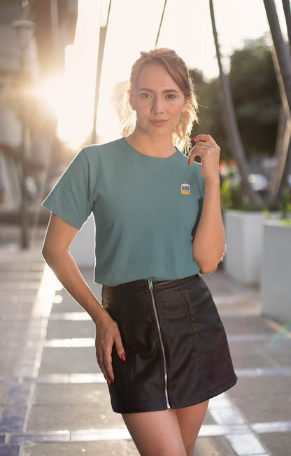 Teal Lisbon Electrico Tram T-Shirt with a subtle tram emblem. A stylish and eco-conscious choice in organic cotton.